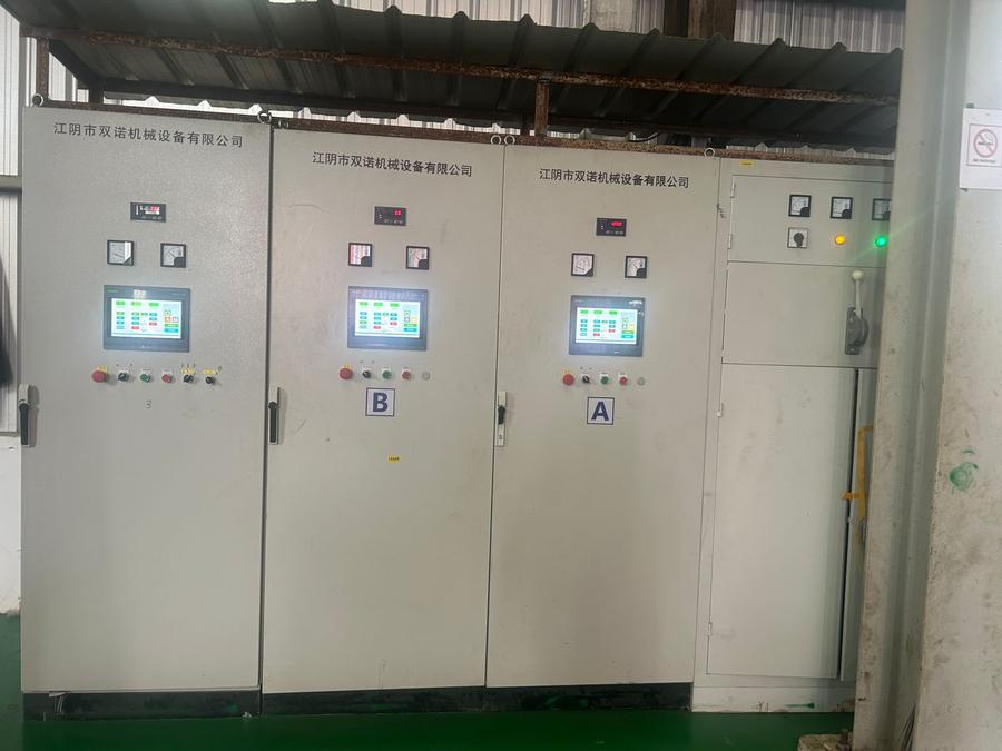 Drying and heat-setting vessels for recycled polyester staple fiber